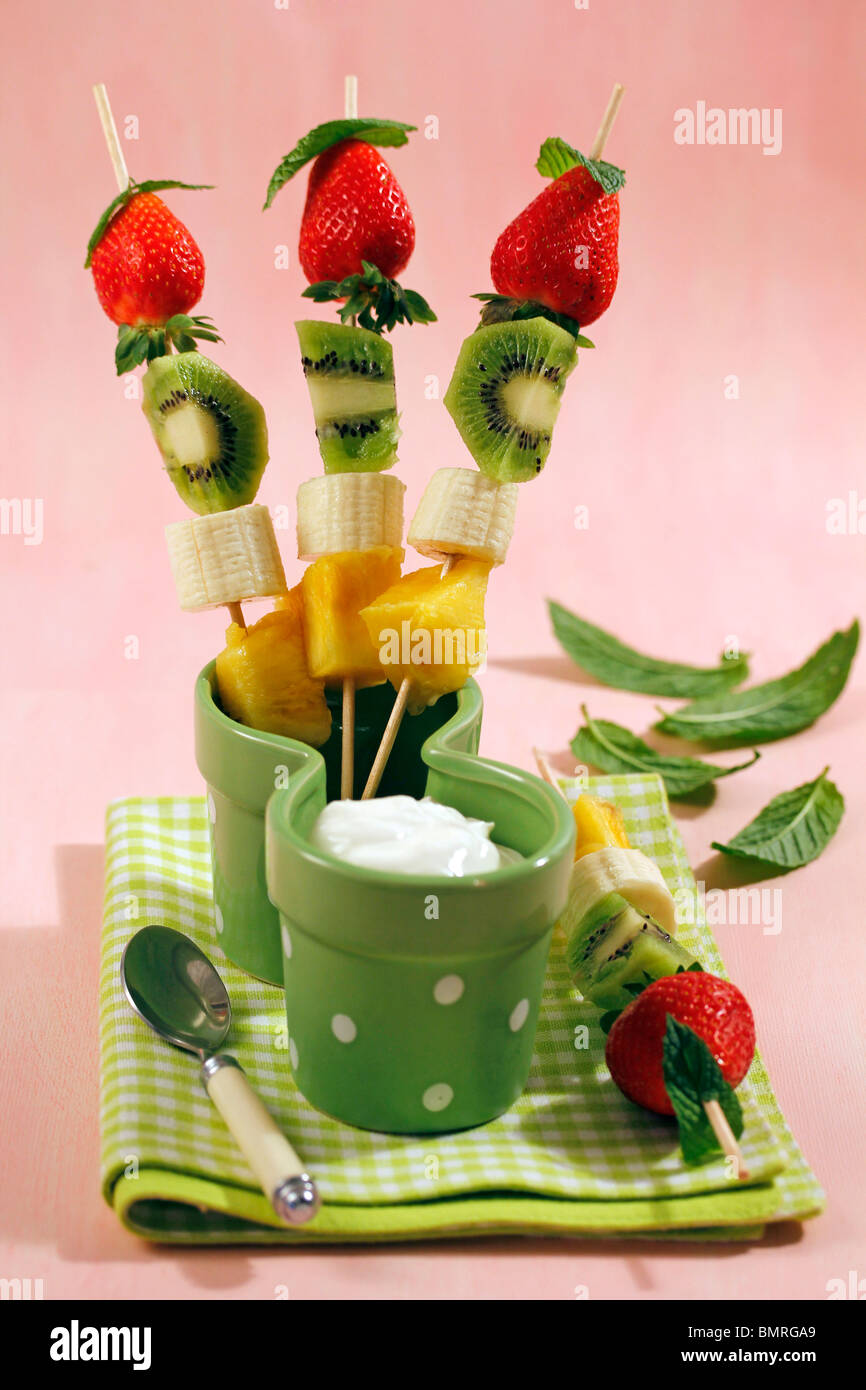 Fruit skewers with yogurt. Recipe available Stock Photo Alamy