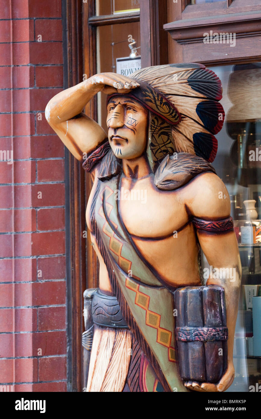 Statue of red indian with feathers outside shop in Windsor UK 104750 Windsor Stock Photo