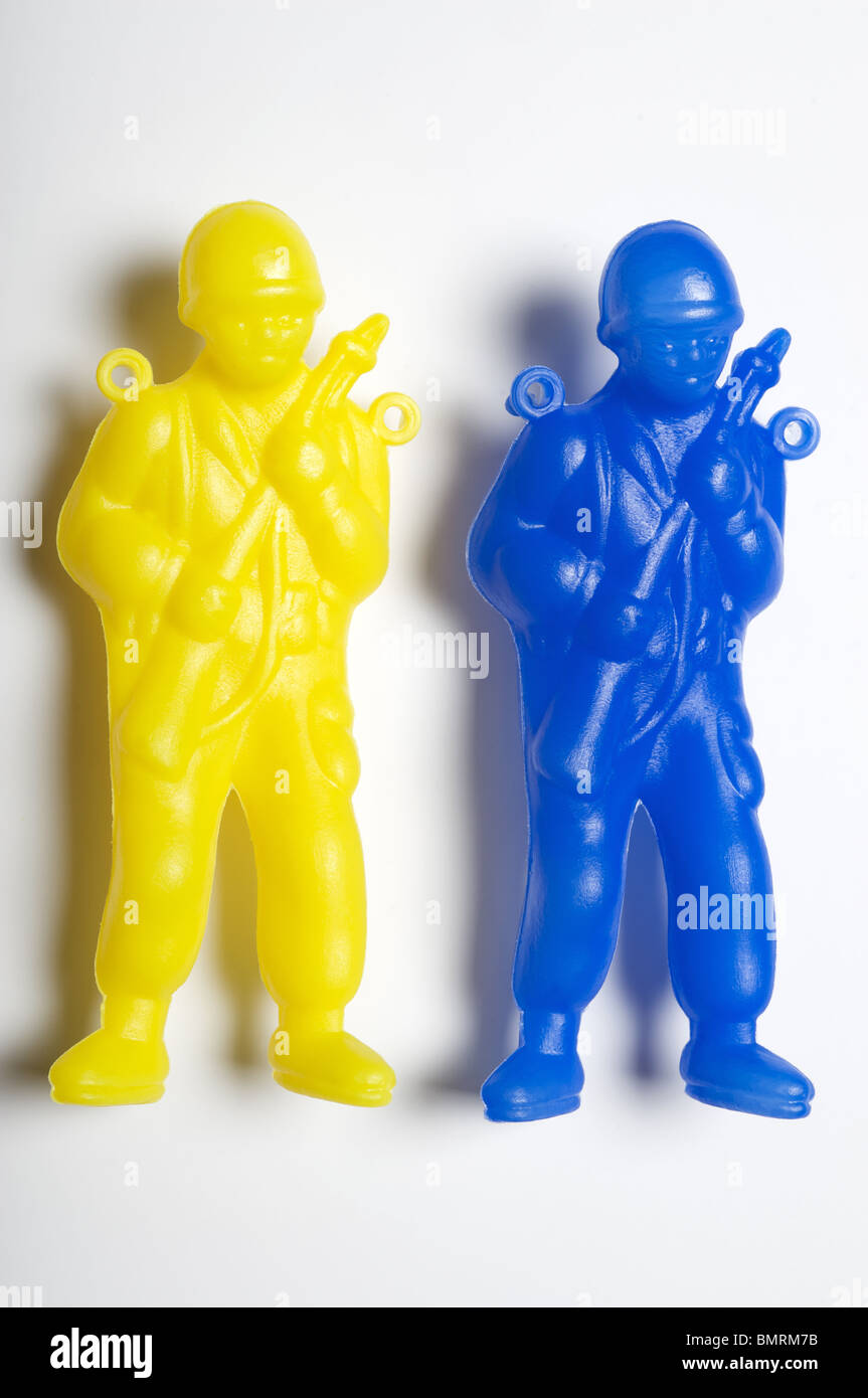 Yellow and blue plastic toy paratroopers Stock Photo Alamy