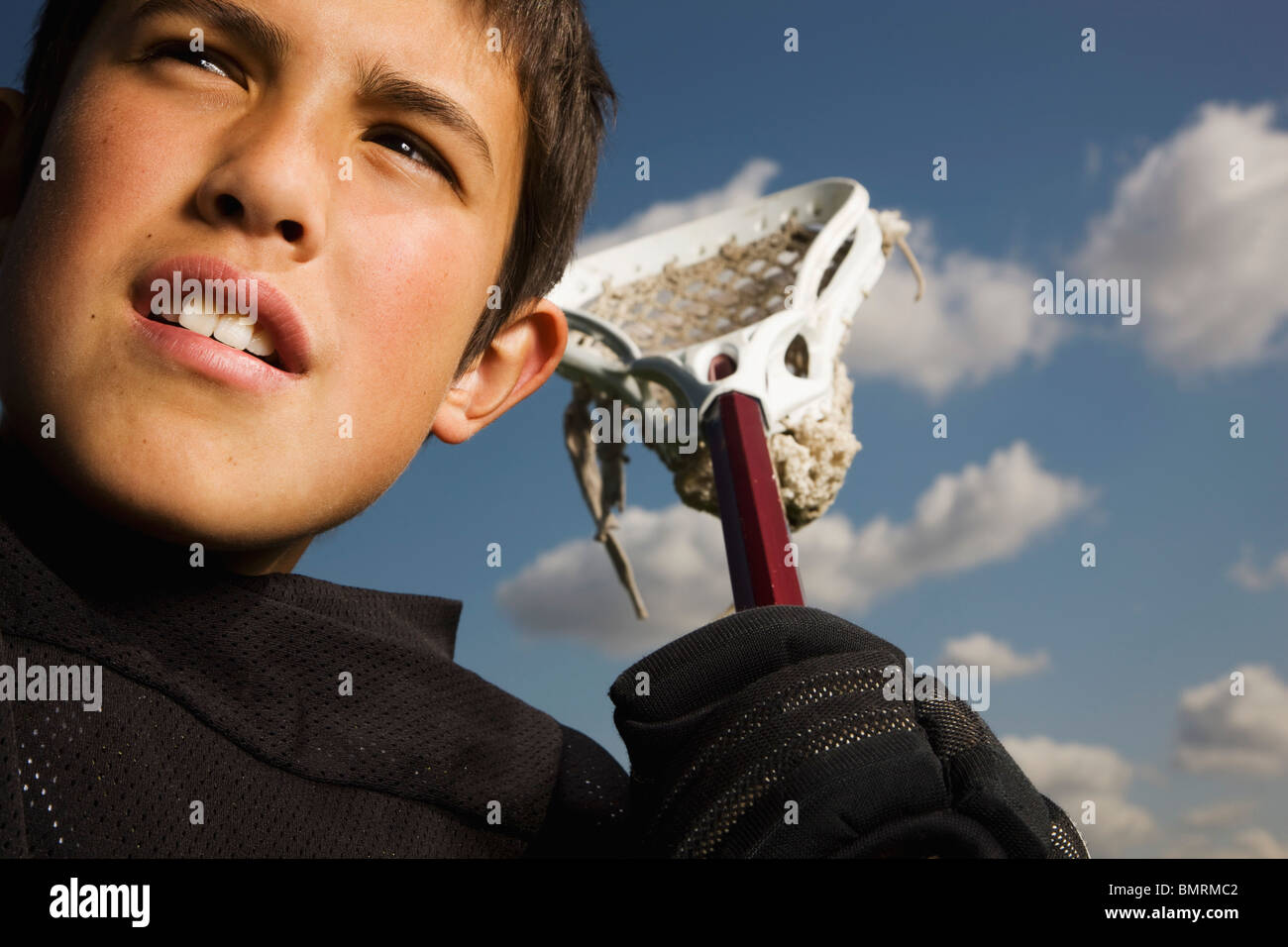 Edmonton, Alberta, Canada; A Boy With Lacrosse Equipment Stock Photo