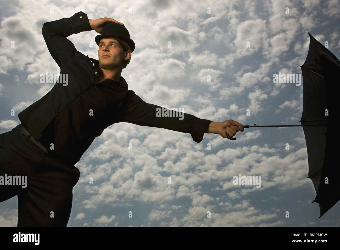 Businessman wearing bowler hat hi-res stock photography and images - Alamy
