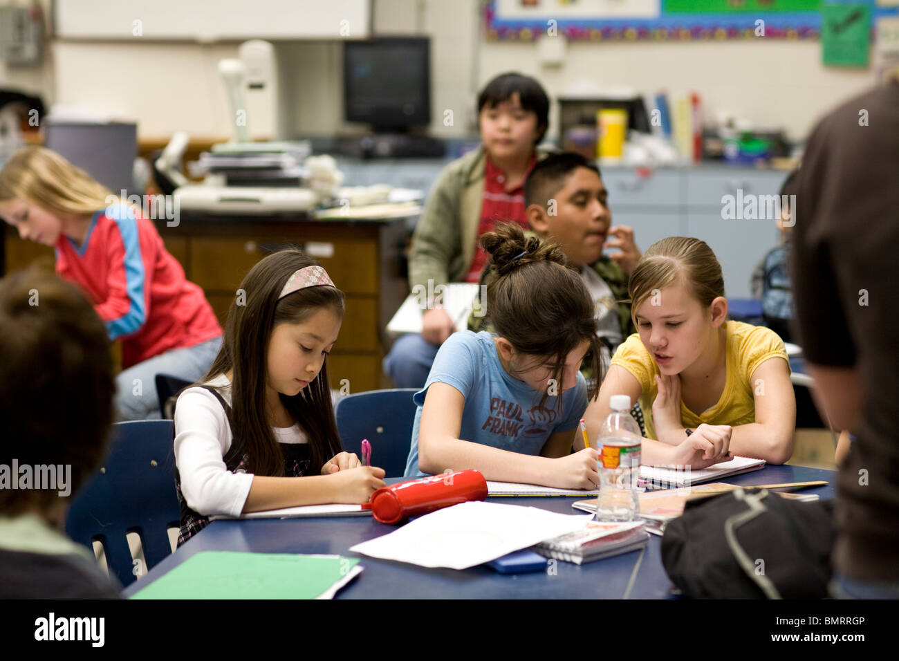 Students at work in ethnically mixed classroom at Kealing Middle School in Austin, Texas, USA