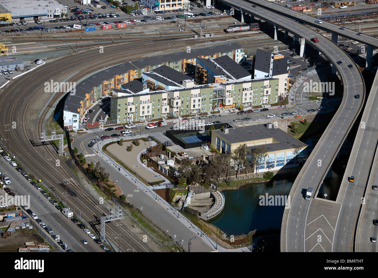 aerial view above apartment complex built between CalTrain rail line interstate 280 off ramp San Francisco Stock Photo