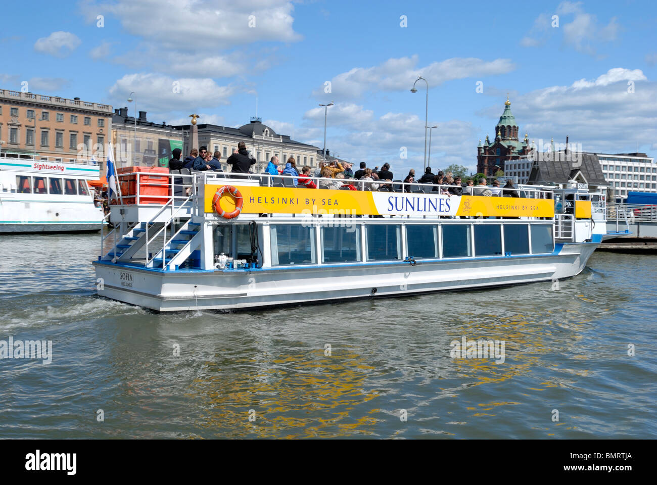 A sightseeing boat departures from the Kauppatori market square, Helsinki, Finland, Scandinavia, Europe. Stock Photo
