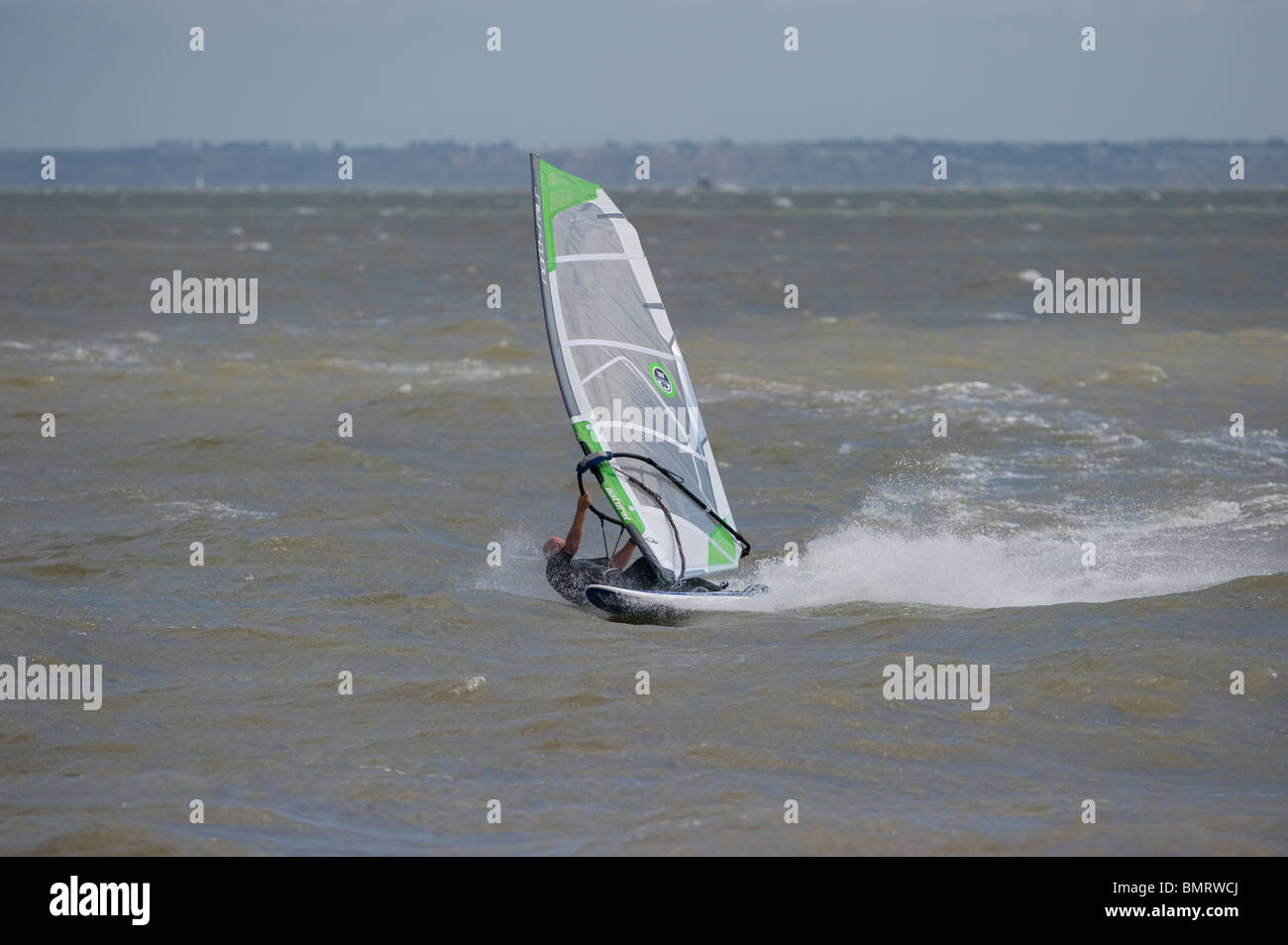 Windsurfing at East Beach, Shoeburyness, Essex, UK. This is a popular site for windsurfing and kitesurfing. Stock Photo