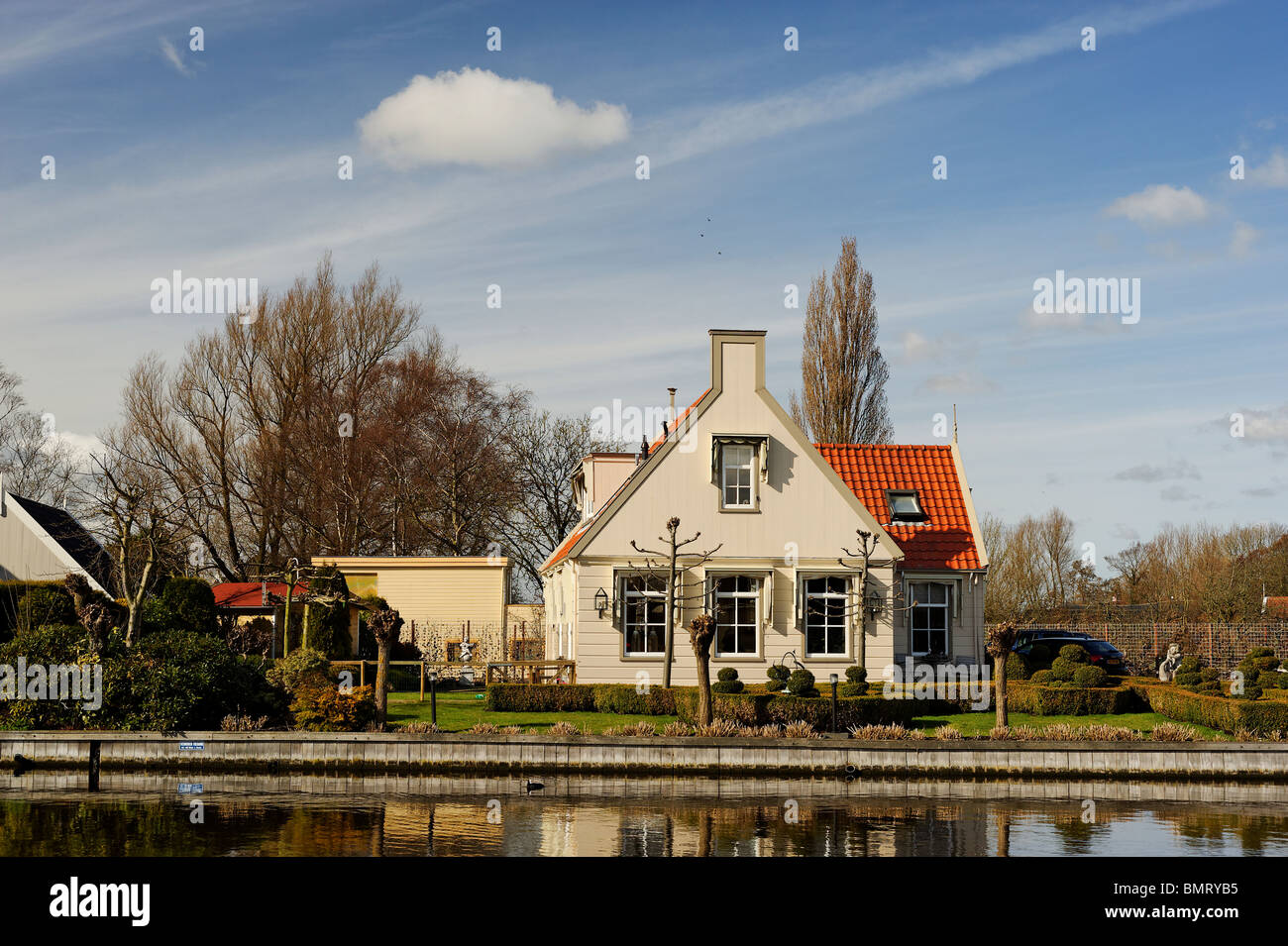 House facing canal In Broek in Waterland, Netherlands. Stock Photo