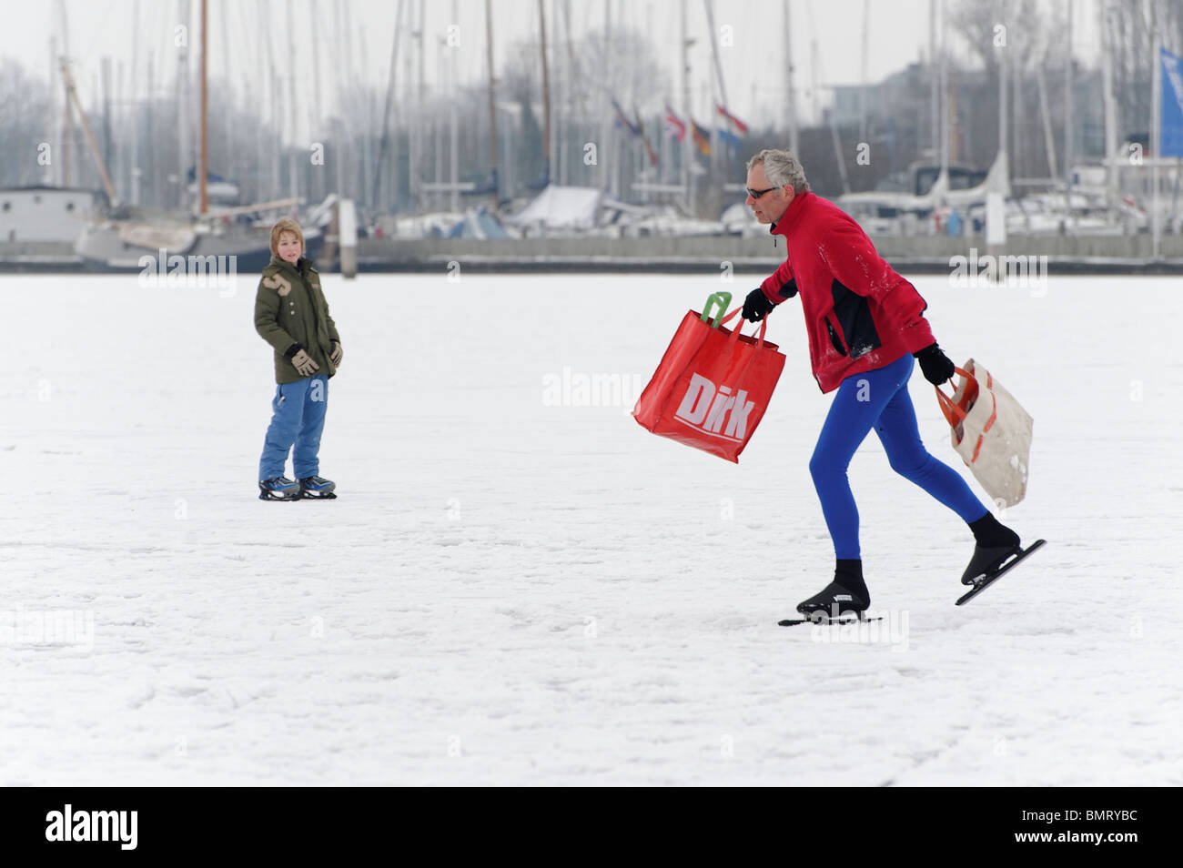 Shopping and Ice Skating on a frozen lake in Amsterdam, Netherlands Stock Photo