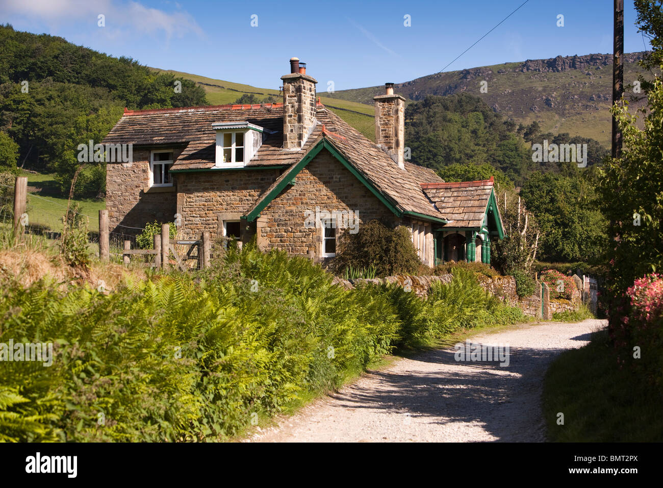 UK, Derbyshire, Edale, Grindsbrook, green painted house near start of Pennine Way long distance path Stock Photo