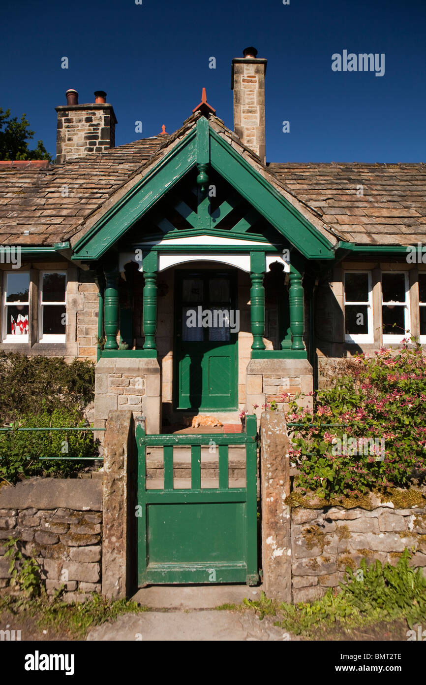UK, Derbyshire, Edale, Grindsbrook, green painted house near start of Pennine Way long distance path Stock Photo