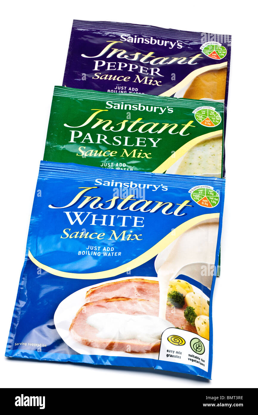Three packets of Sainsburys instant sauce mixes Stock Photo