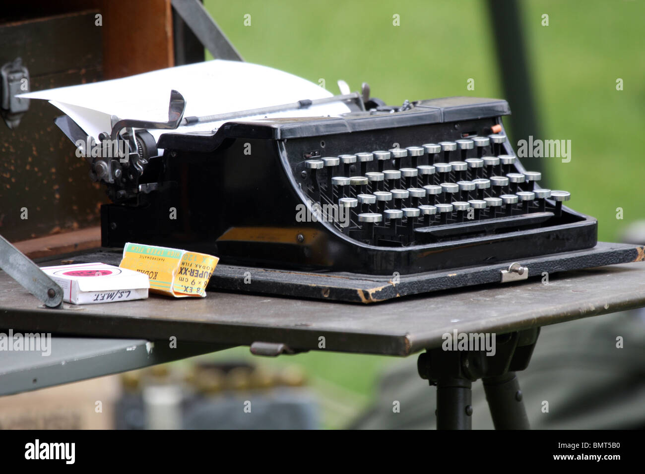 A military typewriter with a written letter equipment at a reenactment Stock Photo