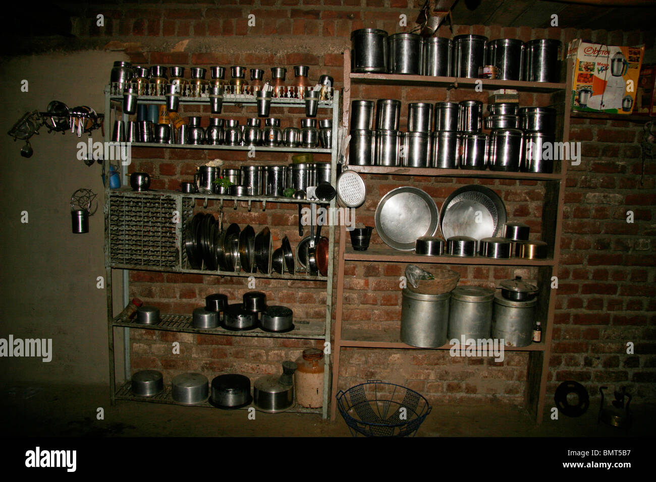 Steel utensils arranged immaculately in Indian Maharashtra farmer's