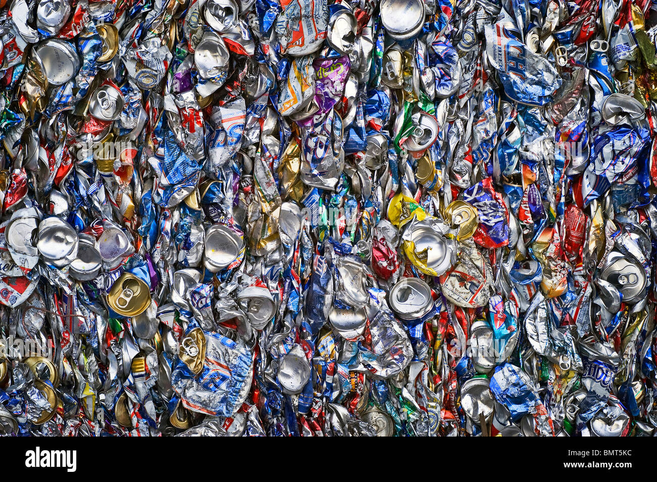 Closeup of aluminum cans that have been crushed and ready for