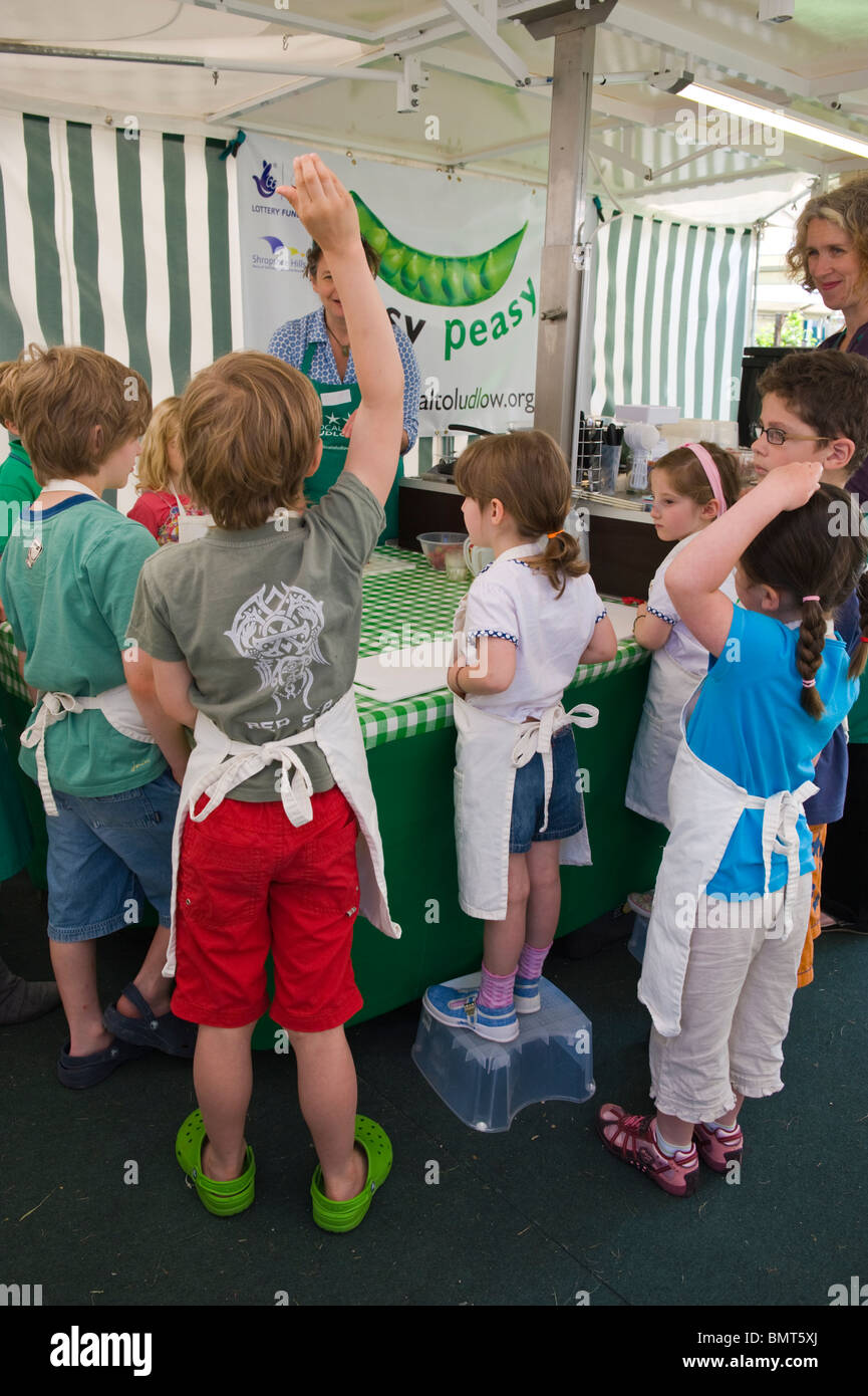 Easy Peasy Cookery School for children making pizza at Hay Festival