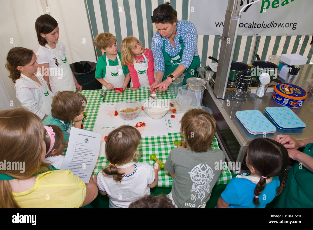 Easy Peasy Cookery School for children making pizza at Hay Festival