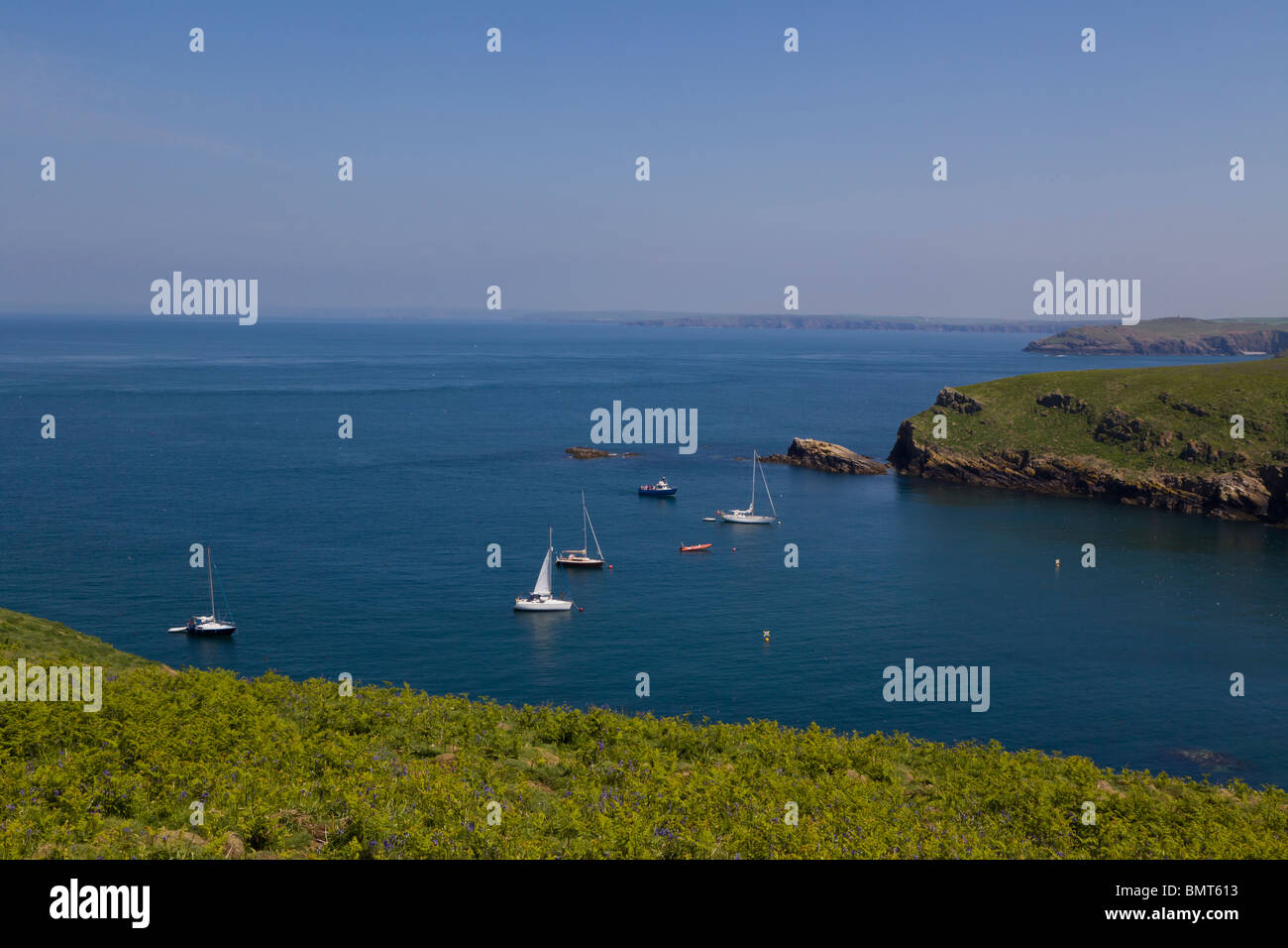 Boats anchored in North Haven, Skomer Island, Pembrokeshire, Wales. Stock Photo