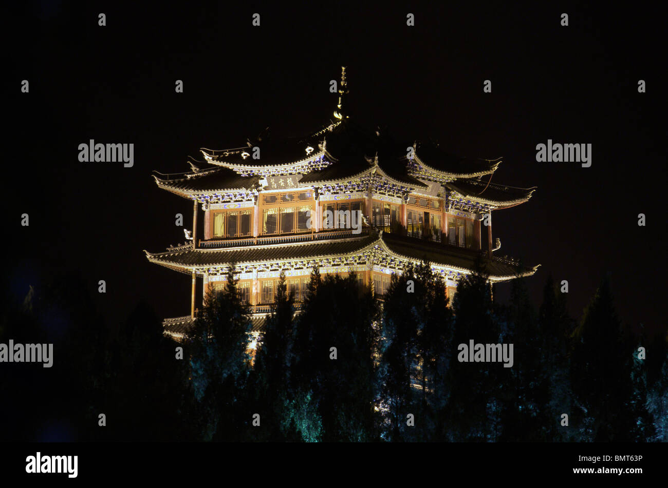 Lit Pavilion at night Lijiang Yunnan China Stock Photo