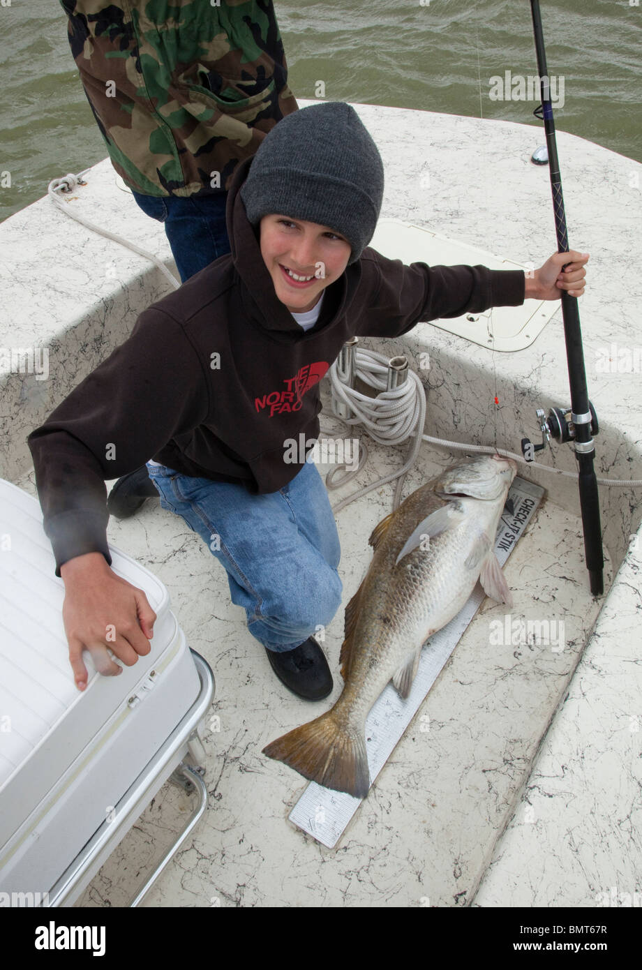 13-year-old boy with black drum caught on live bait off Port Mansfield in  the Lower Laguna Madre of the Texas Gulf Coast, USA Stock Photo - Alamy