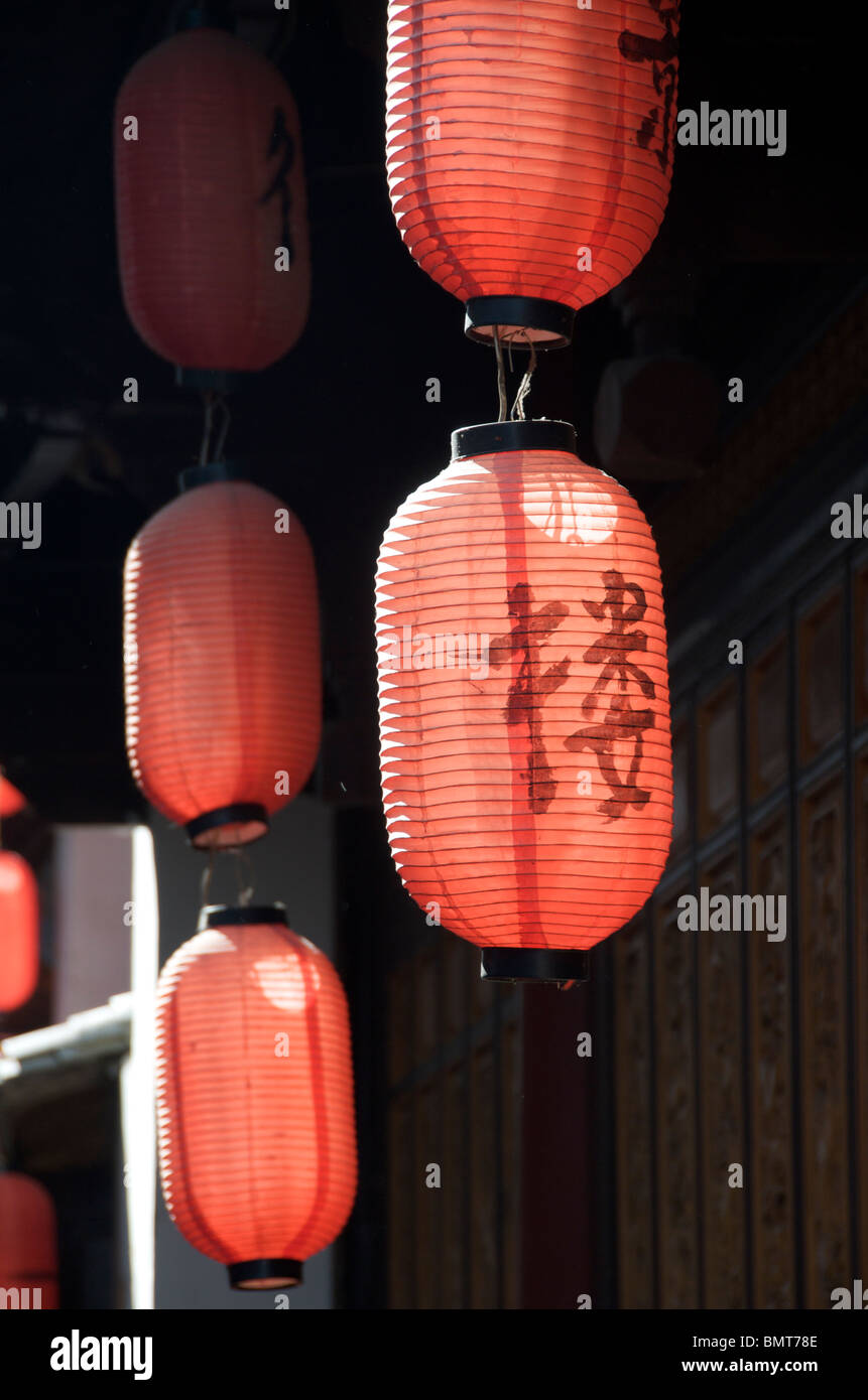 Hanging red paper Chinese lanterns Lijiang Old Town Yunnan China Stock Photo