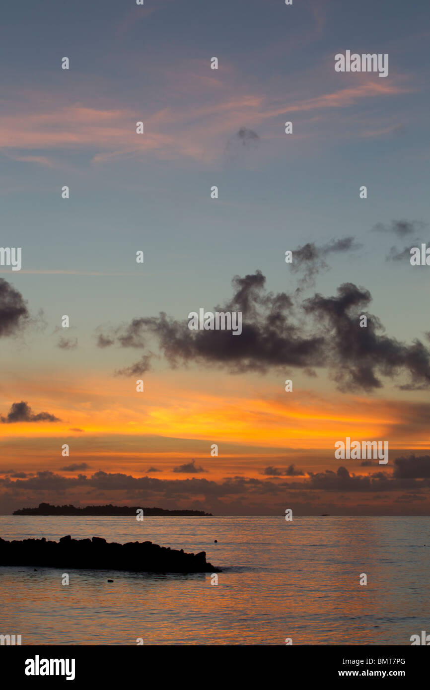 Early morning sunrise over the sea from Pilau Selingan Island, Sabah, Borneo, Malaysia. Stock Photo