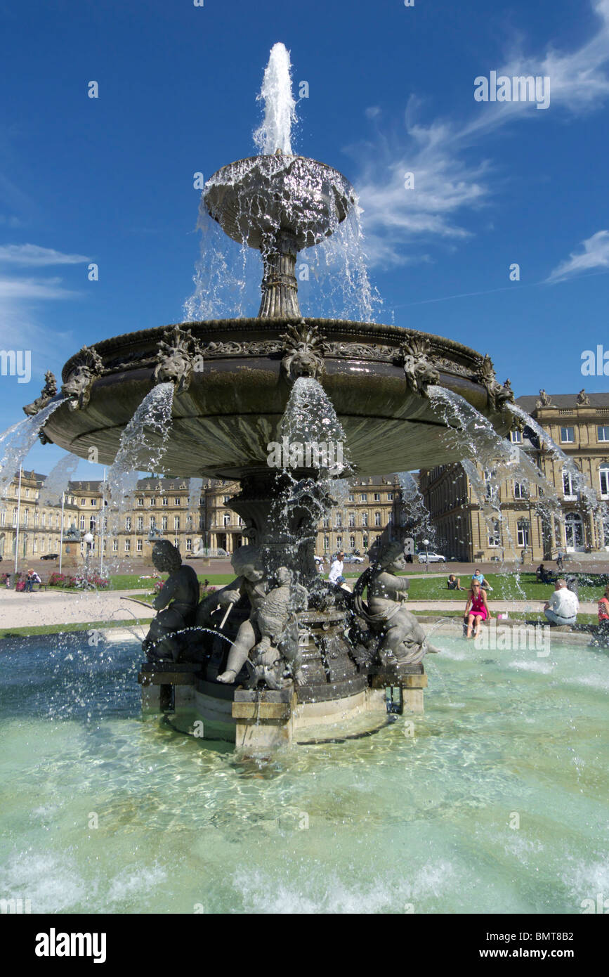 Fountain at Schlossplatz square, Neues Schloss (New Palace) in the background, Stuttgart, Baden-Wuerttemberg, Germany Stock Photo