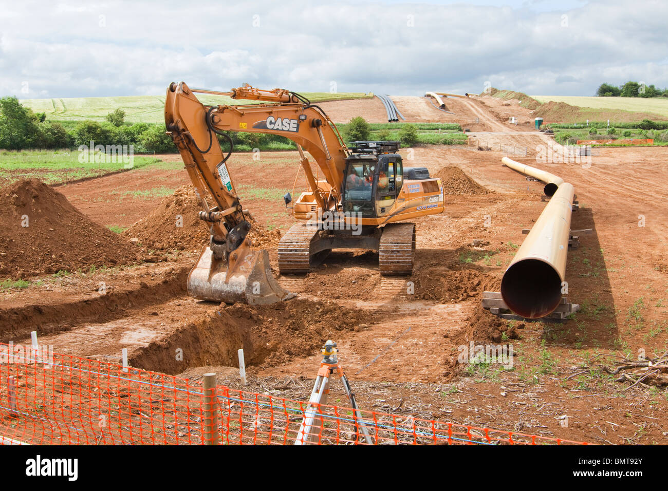 National Grid natural gas pipeline being laid, seen here crossing the Cotswolds near Syreford, Gloucestershire Stock Photo