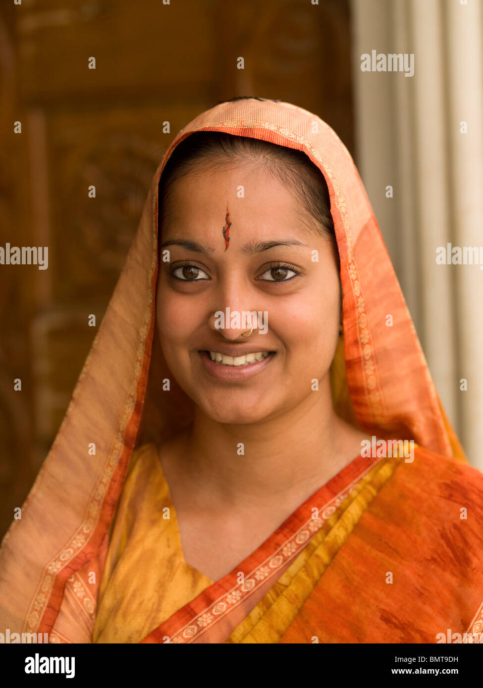 India;Portrait Of Women In Orange Sari Stock Photo - Alamy