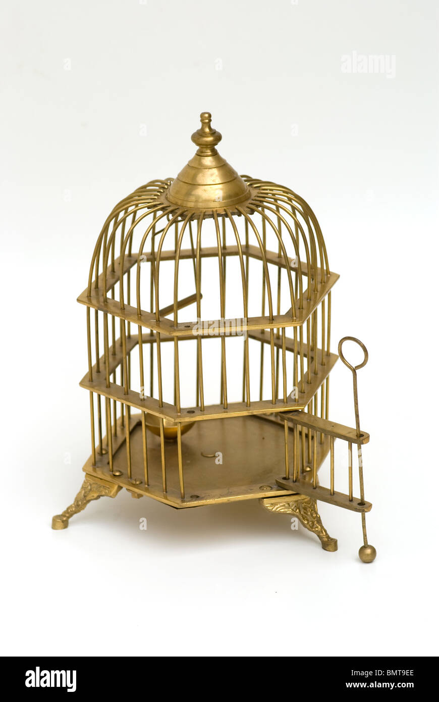 Ornate vintage brass bird cage with open door Stock Photo - Alamy