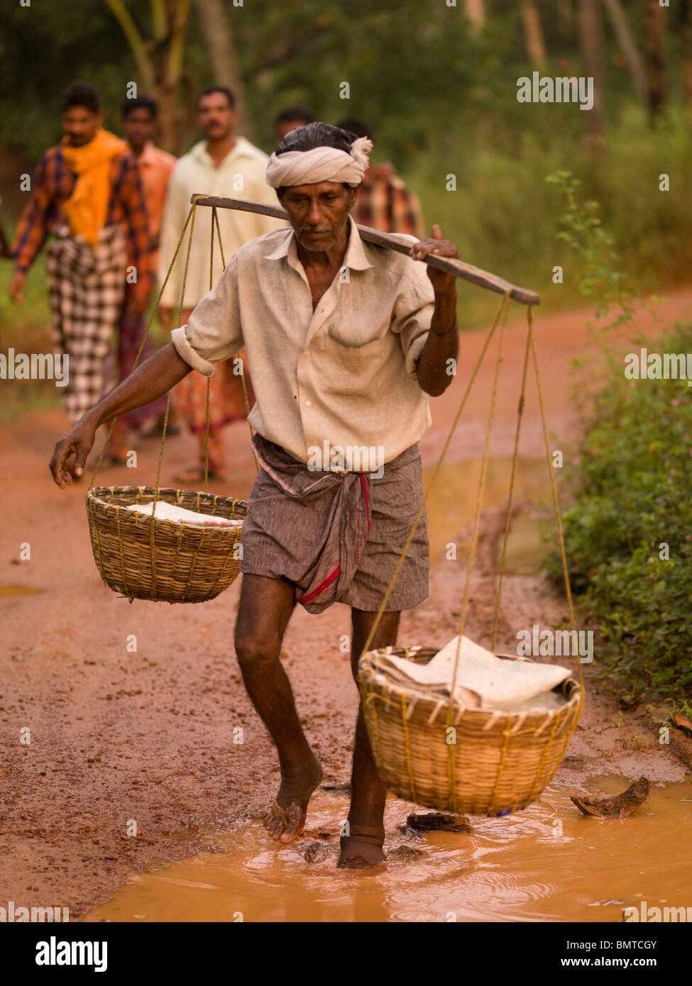 Fisherman carrying baskets hi-res stock photography and images - Alamy