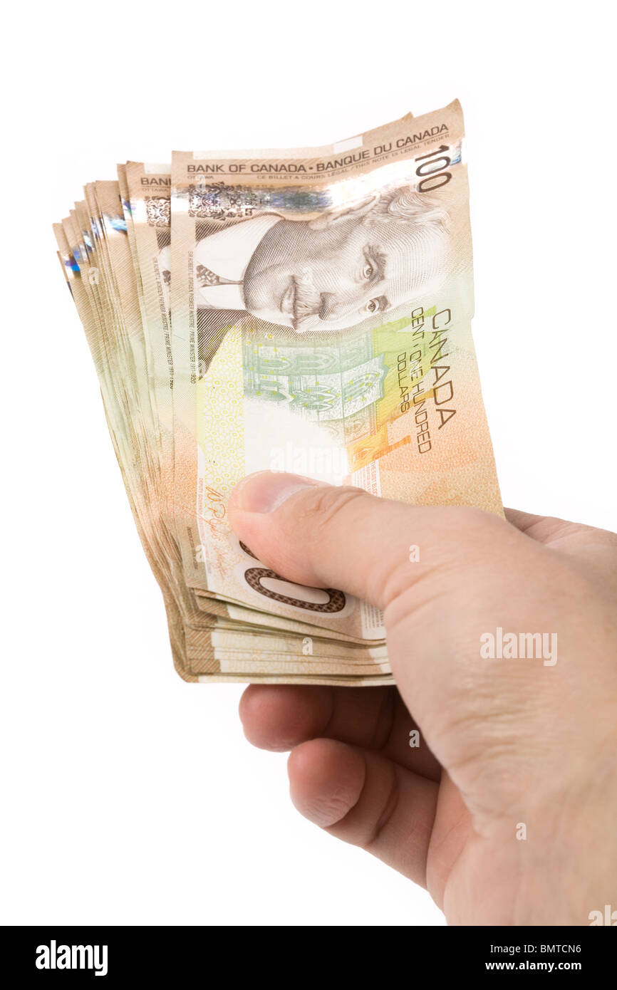 Canadian currency hand hi res stock photography and images Alamy