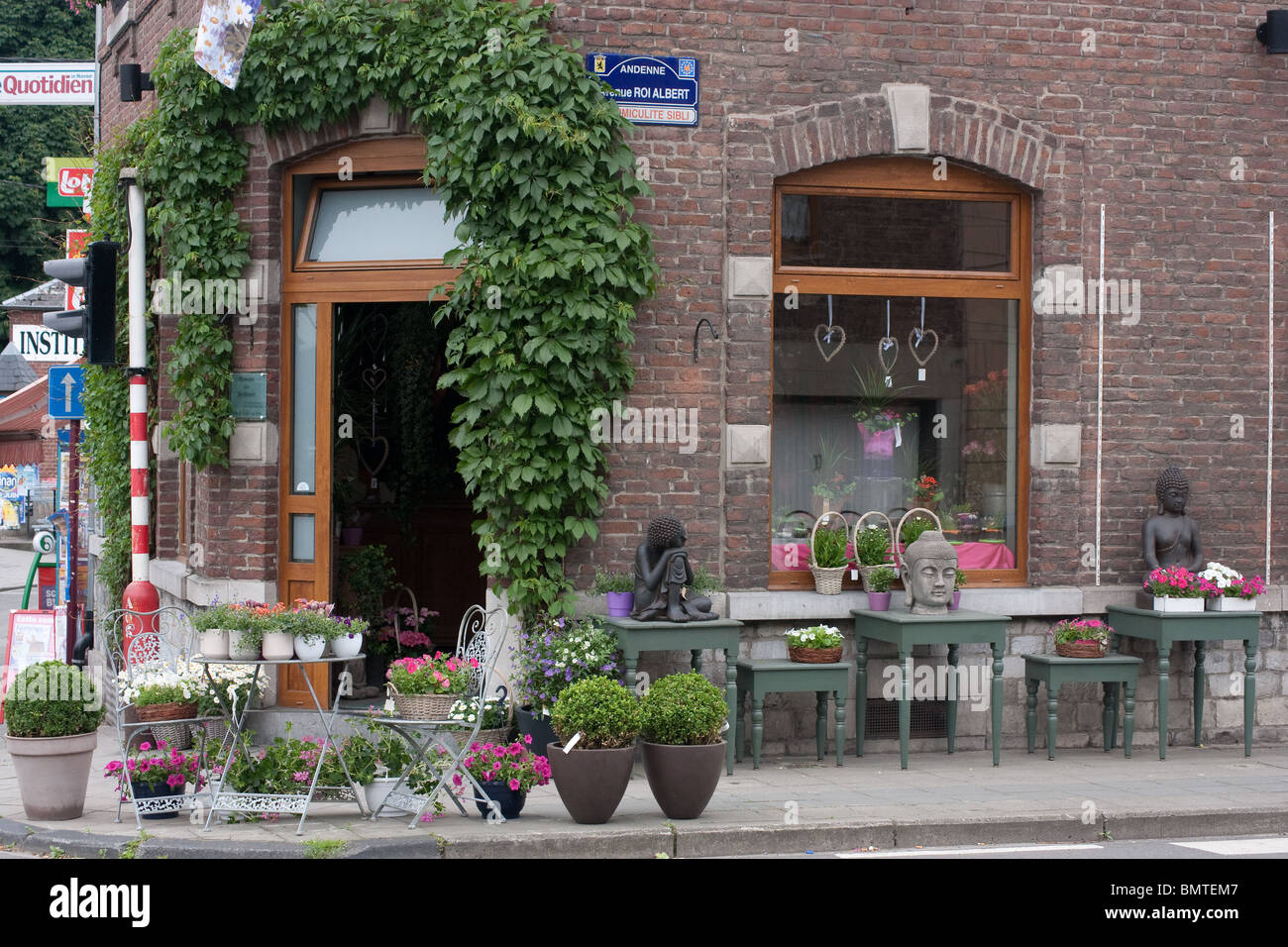 village flower shop sign pots vases tables vine Stock Photo Alamy
