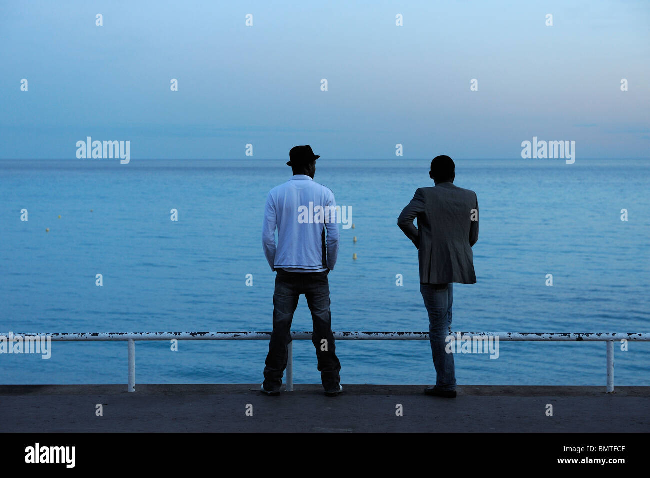 Friends share memories Stock Photo - Alamy