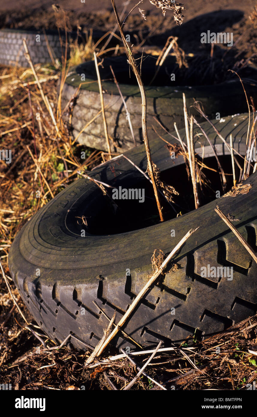 old lorry tyres left at the roadside uk Stock Photo