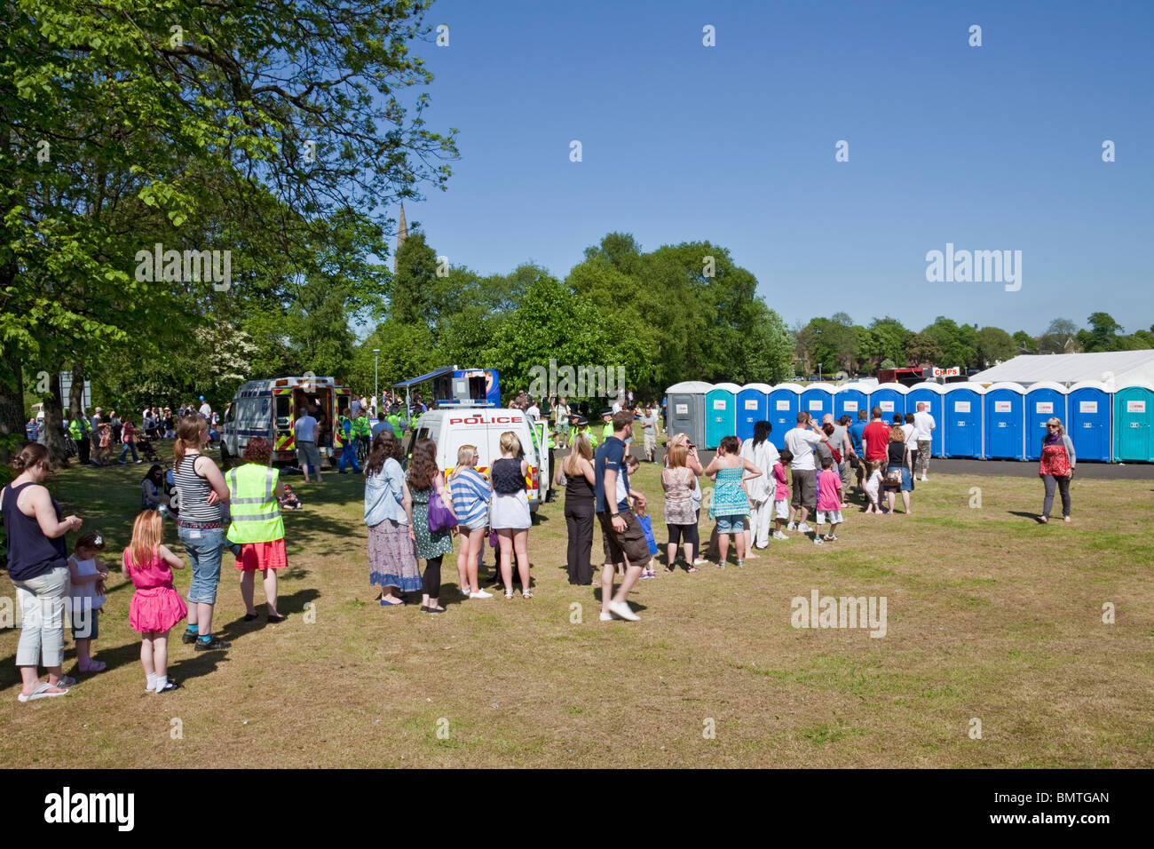 queue for the toilets at Glasgow's Southside Festival 2010 in Queens Park recreation area. Stock Photo
