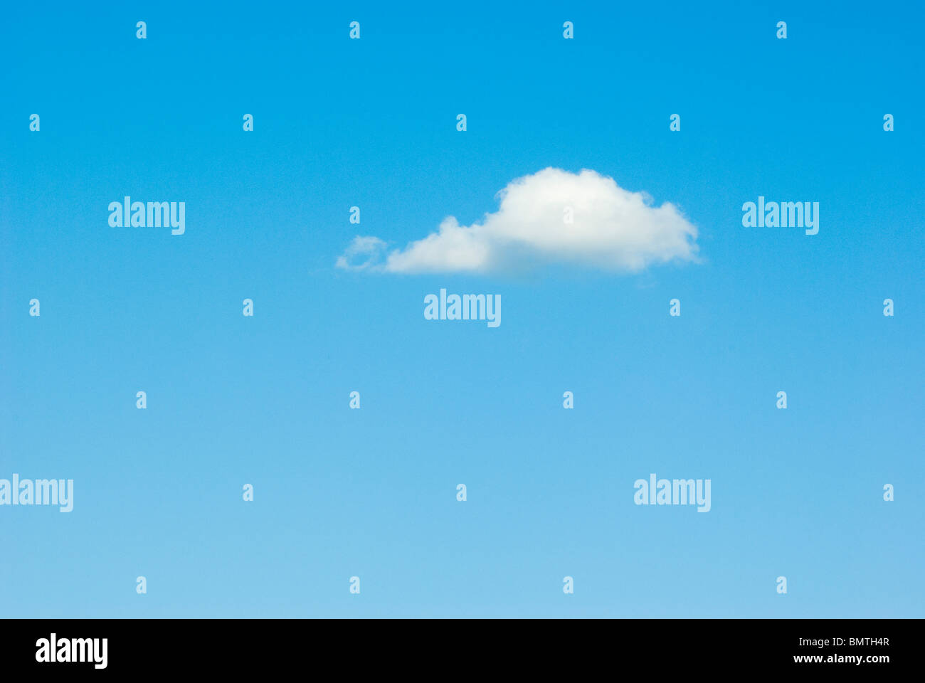 Lone cloud in a blue sky Stock Photo