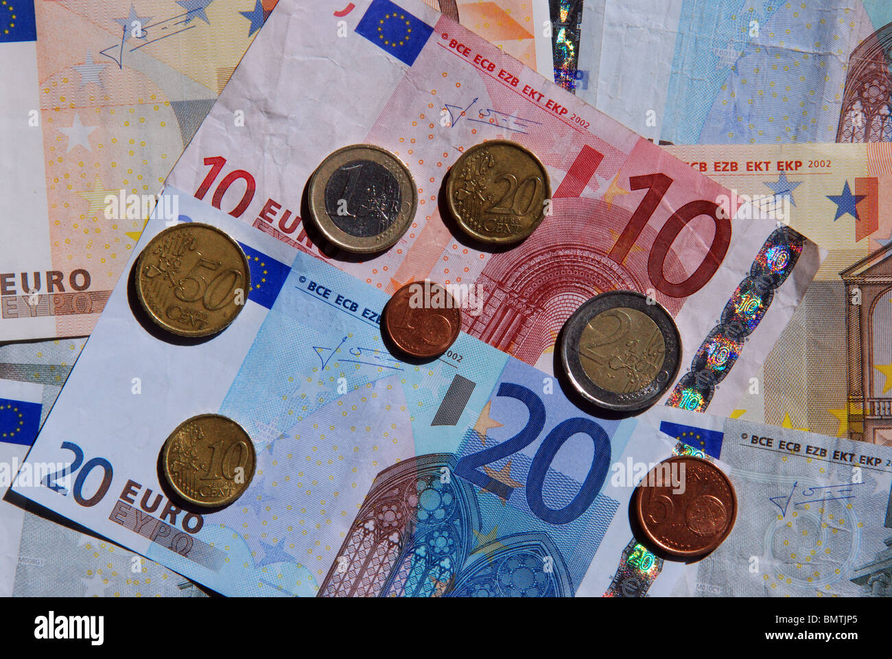Euro coins and notes, Mijas Costa, Costa del Sol, Malaga Province Euro coins and notes, Mijas Costa, Costa del Sol, Malaga Province