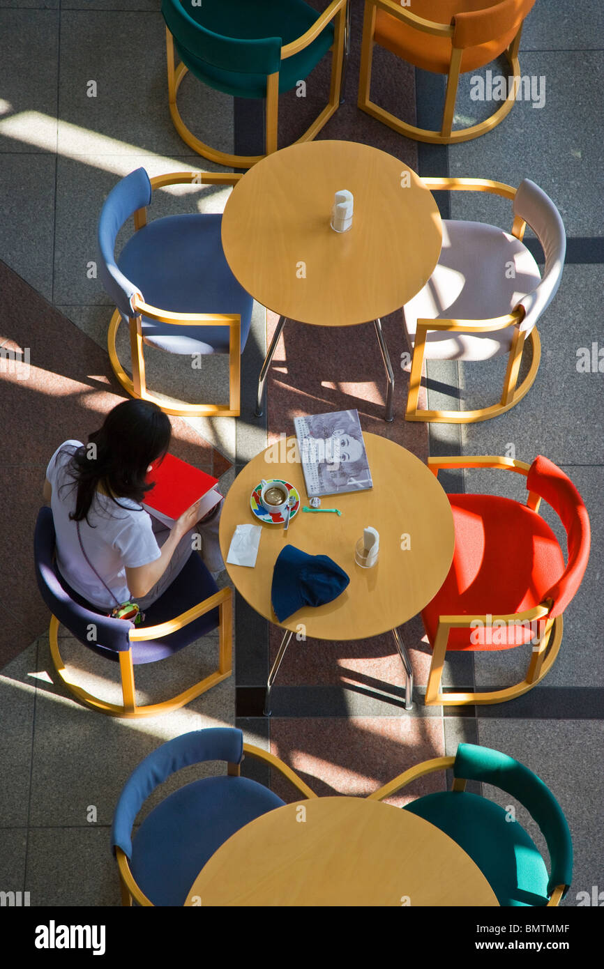 An interior view of the sunny cafe of the Tokyo Metropolitan Museum of Photography at Yebisu Garden Place, located in the Ebisu area of Tokyo, Japan. Stock Photo