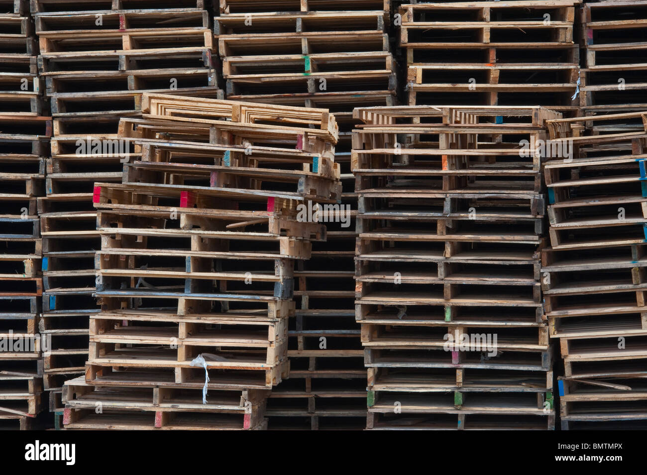 Pallets stacked at a recycling company in Mason County, Michigan, USA
