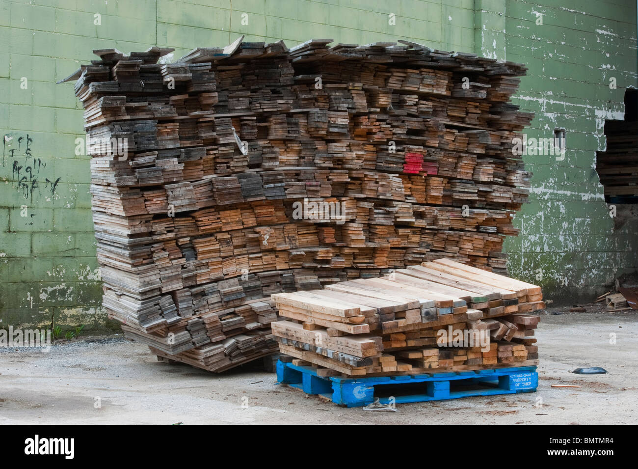 Pallets stacked at a recycling company in Mason County, Michigan, USA