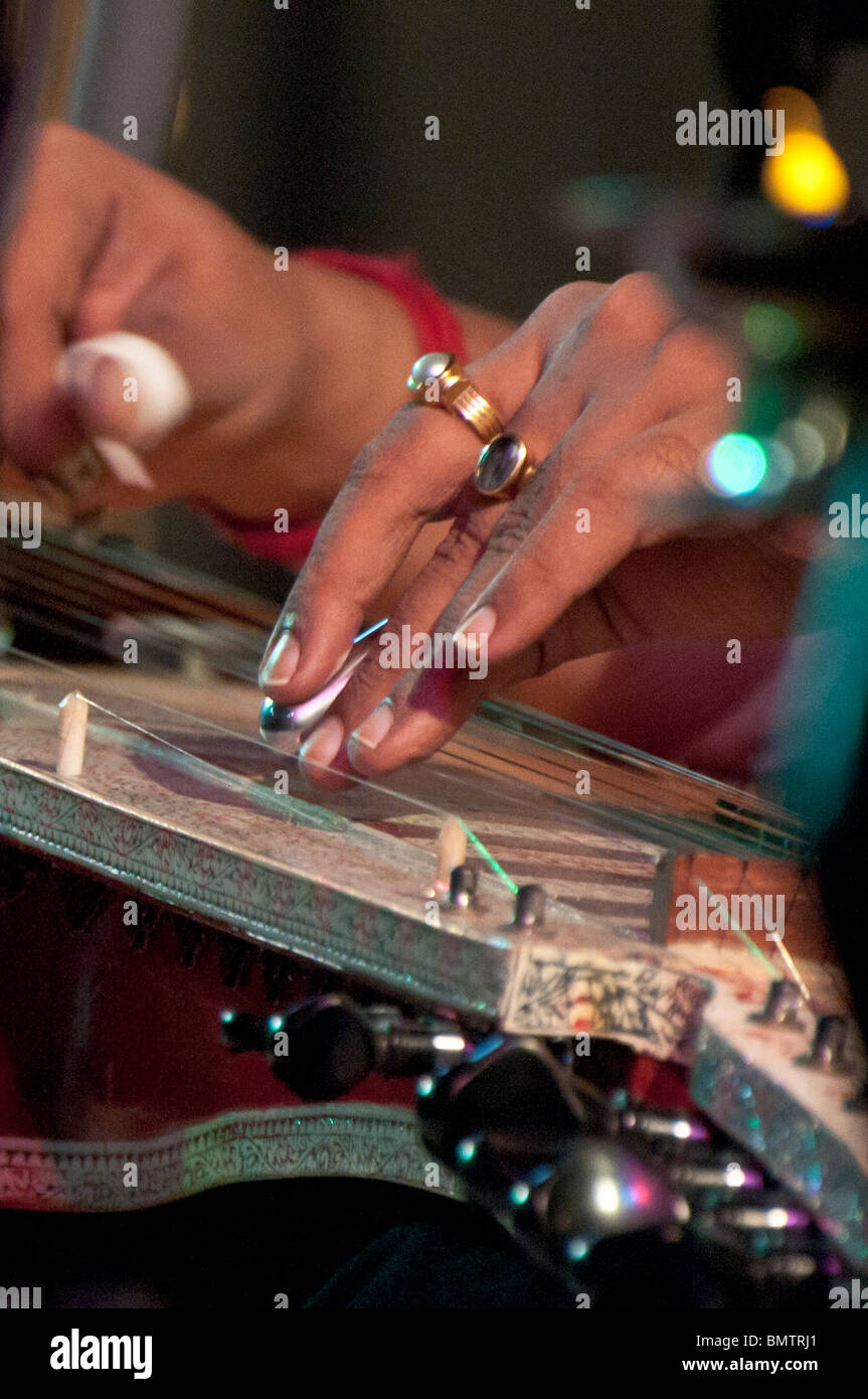 Close up of a musician playing lap steel, pedal guitar, slide guitar on  stage Stock Photo - Alamy