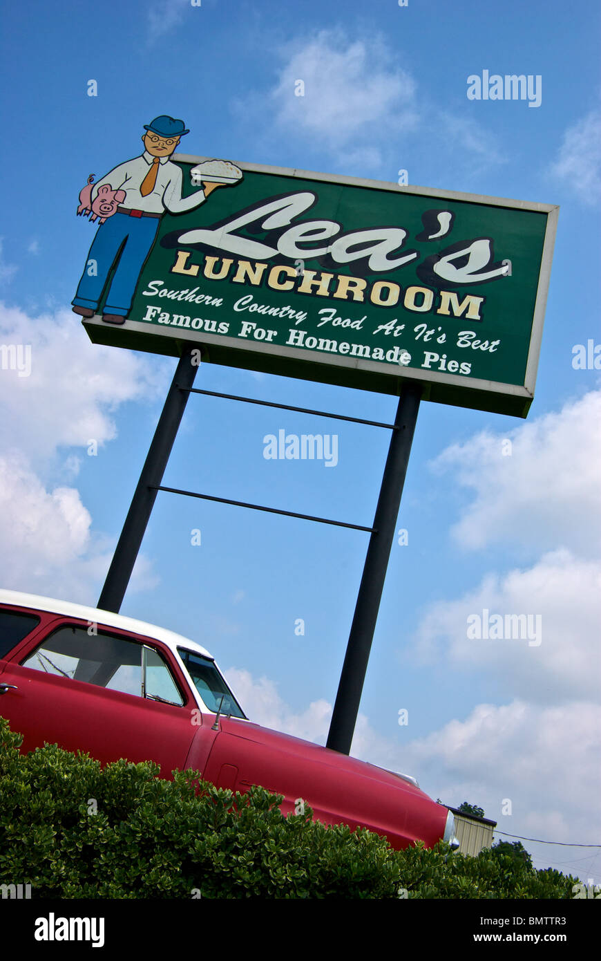 Lea's Lunchroom diner advertising sign and old derelict Studebaker