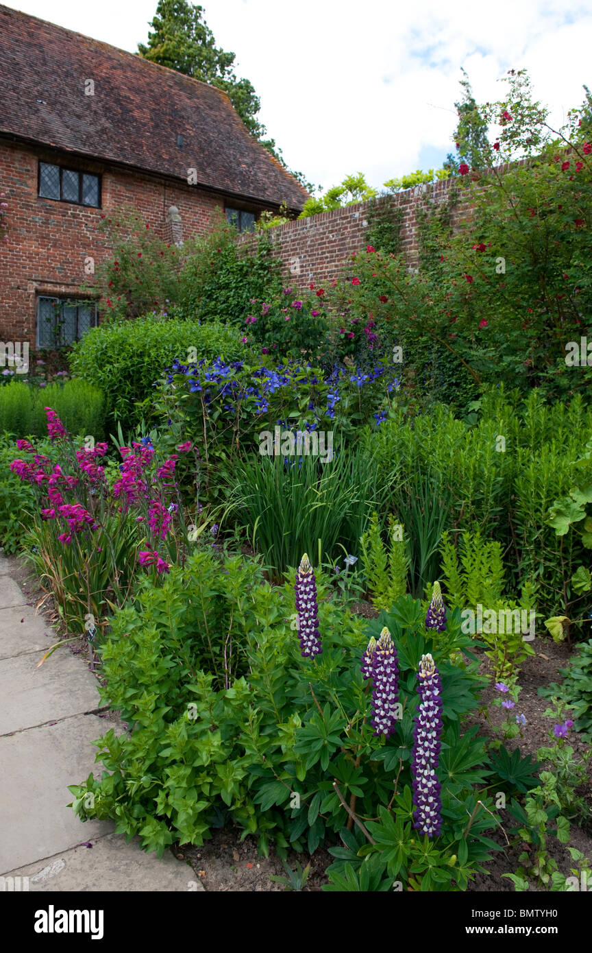 English country garden with  herbaceous perennial displays of flowers Stock Photo