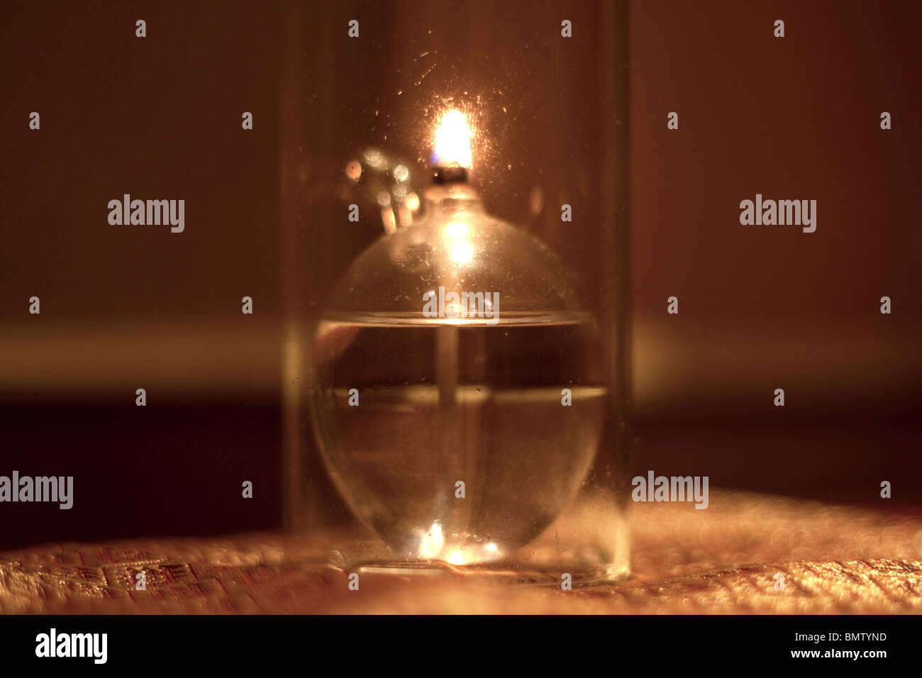 Oil candle burning Stock Photo Alamy