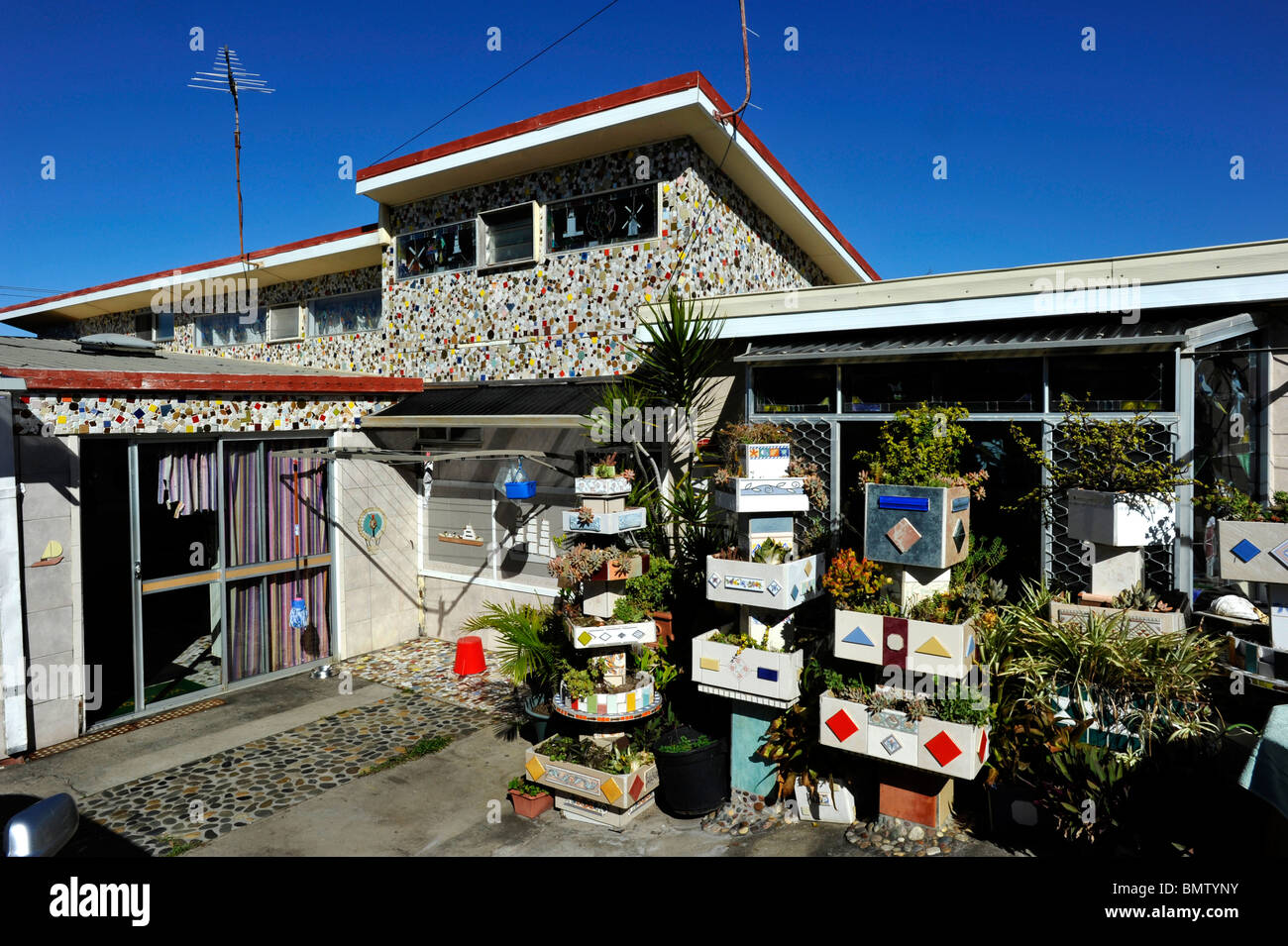 An eccentric home decorated with ceramic tiles at Ballina on the Northern NSW Coast Australia Stock Photo