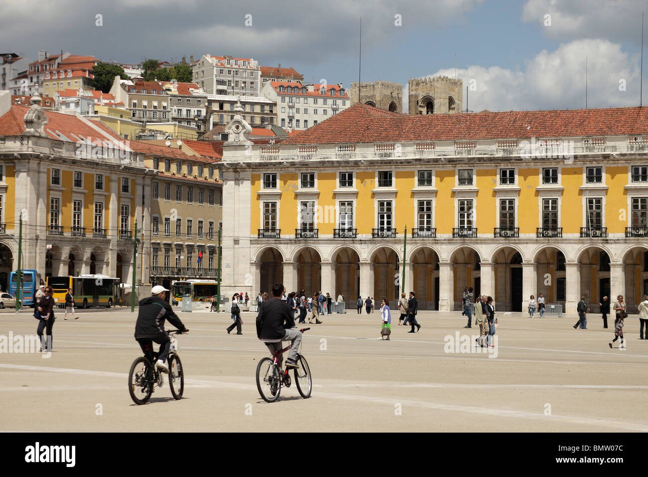 cyclists on the square Praca do Comercio or Terreiro do Paco in Lisbon, Portugal, Europe Stock Photo
