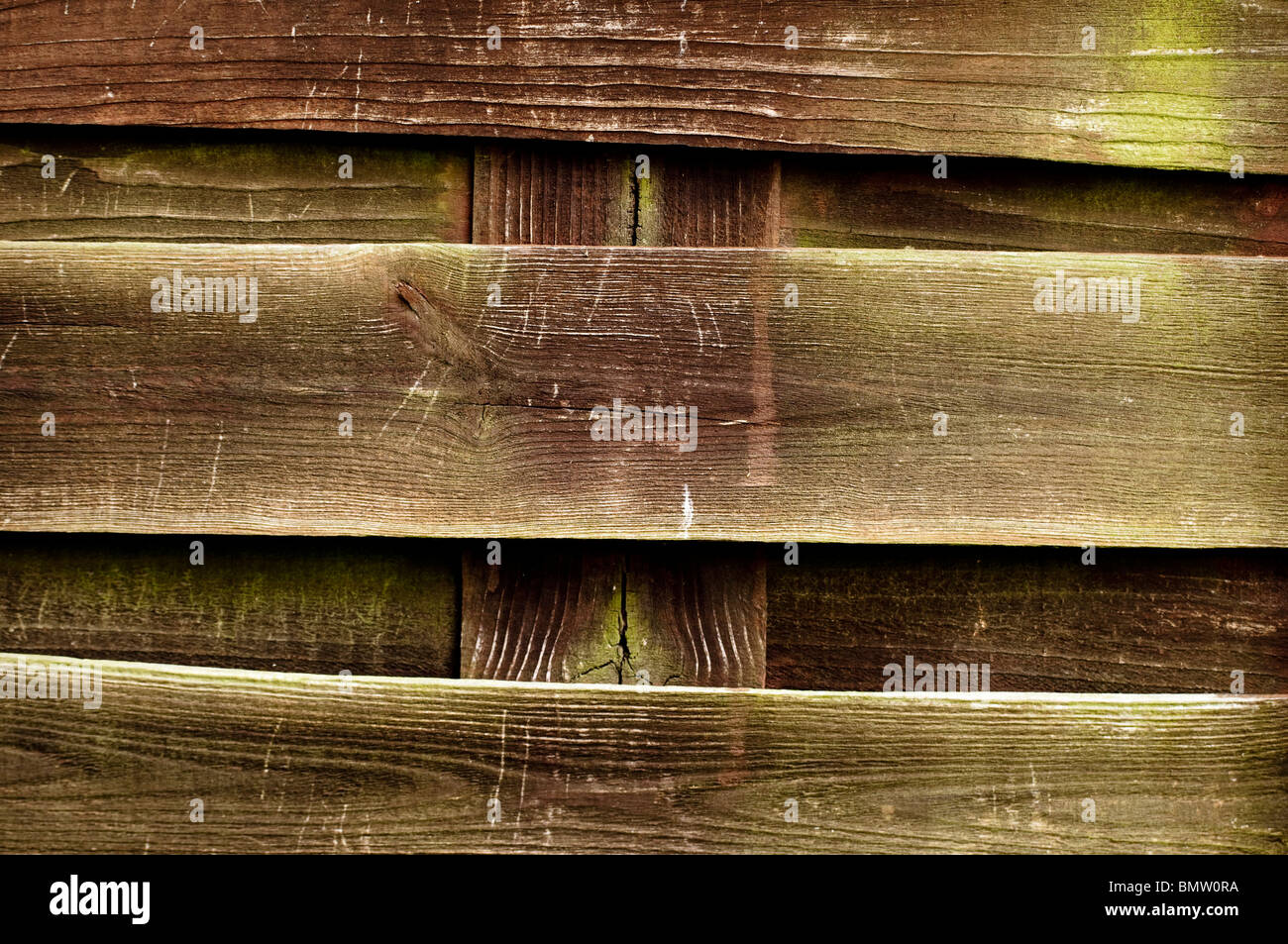 Close up of a weathered garden fence: semi-abstract / background Stock Photo