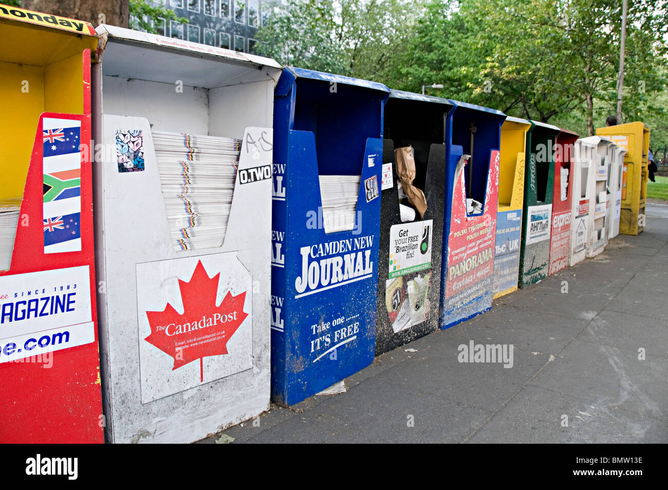 free newspaper boxes outside euston station london Stock Photo Alamy