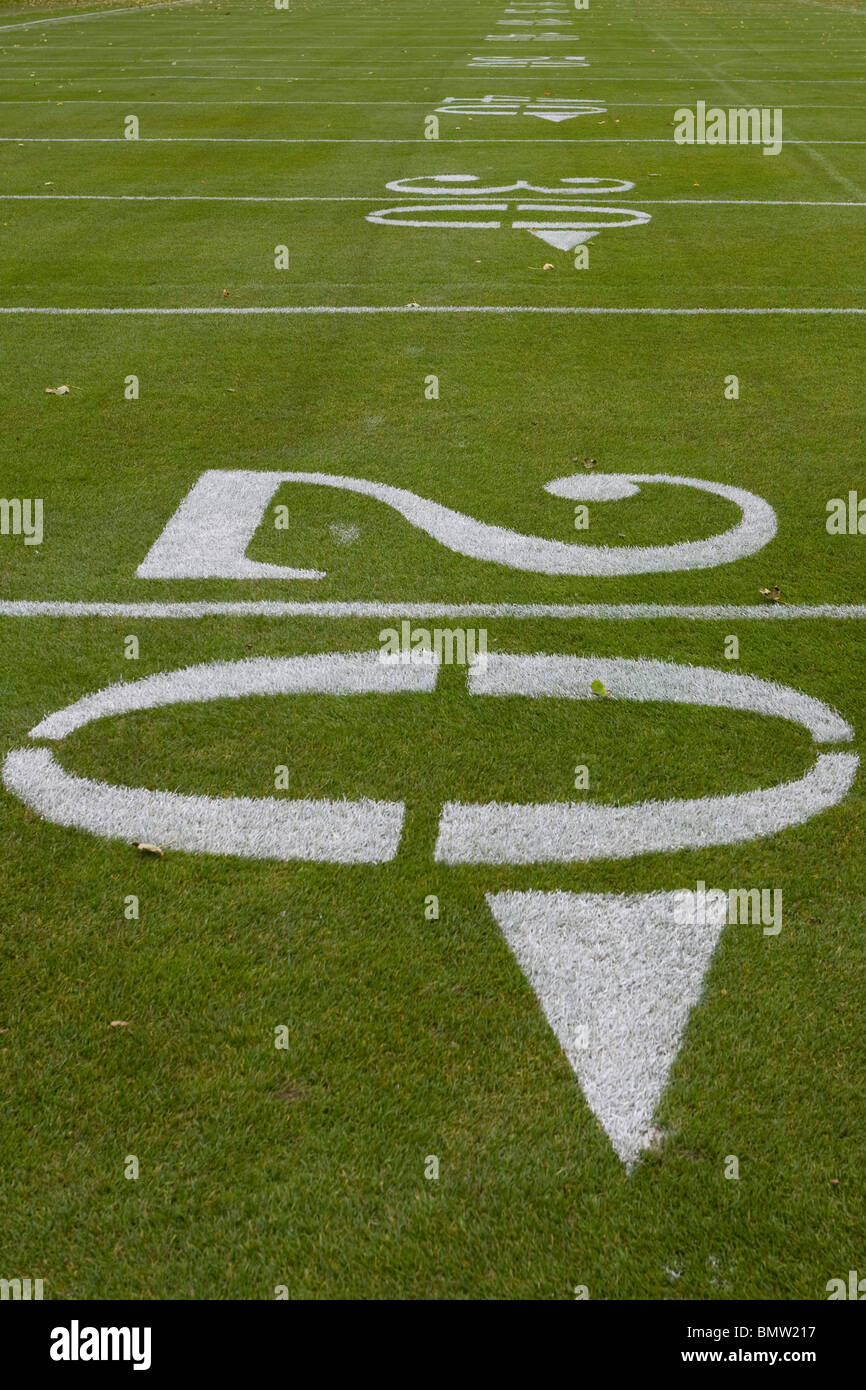 American football pitch at the 20 30 yard line Stock Photo