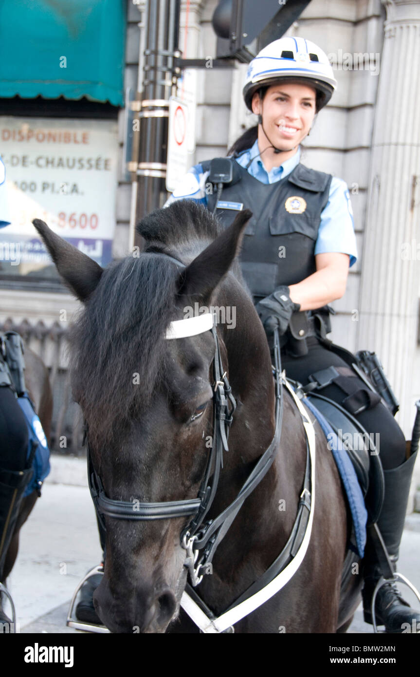 Female police officer riding horse Montreal Canada Stock Photo Alamy