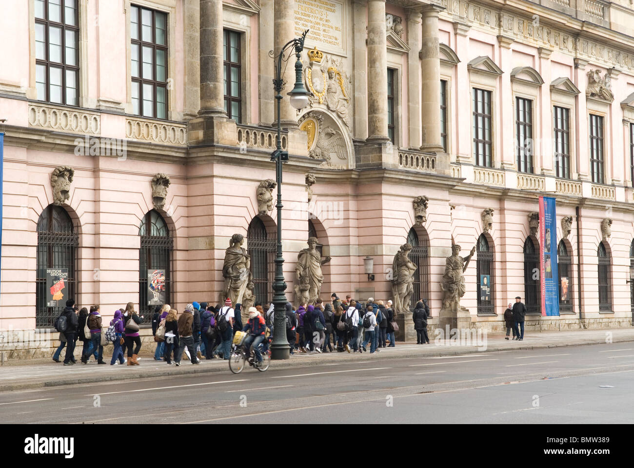 Tourists walking into Zeughaus historisches museum Unter den Linden Berlin Germany Stock Photo